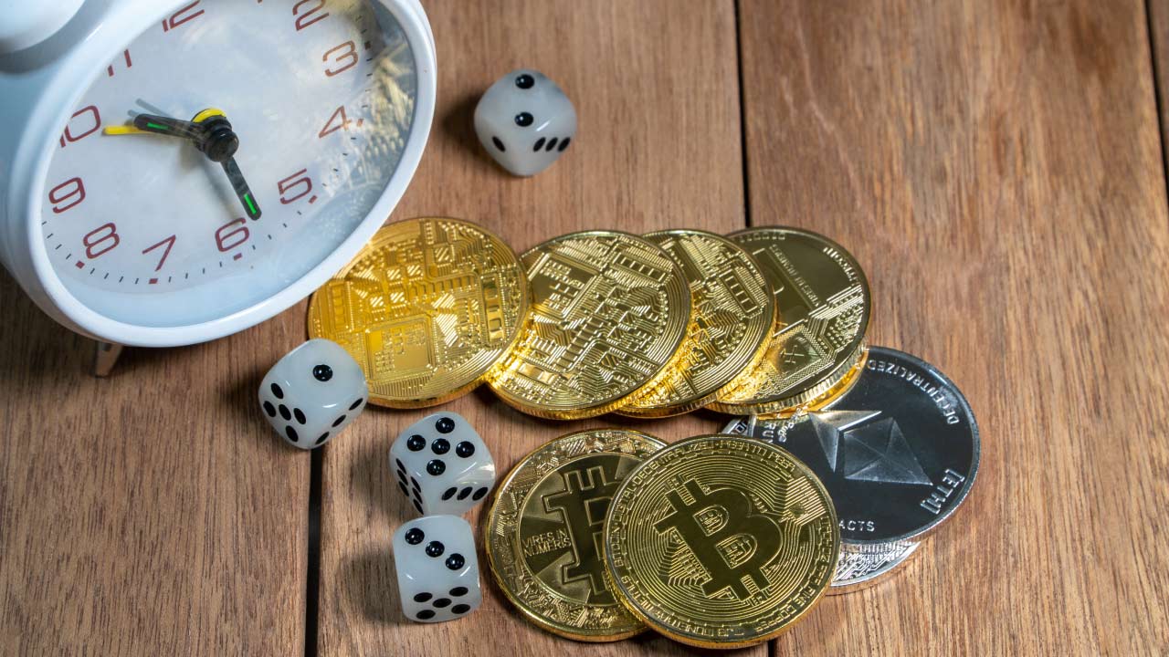 An image symbolising cryptocurrency trading time frames, featuring a clock, Bitcoin and Ethereum coins, and dice, representing the strategic decision-making involved in selecting optimal time frames for crypto trading.